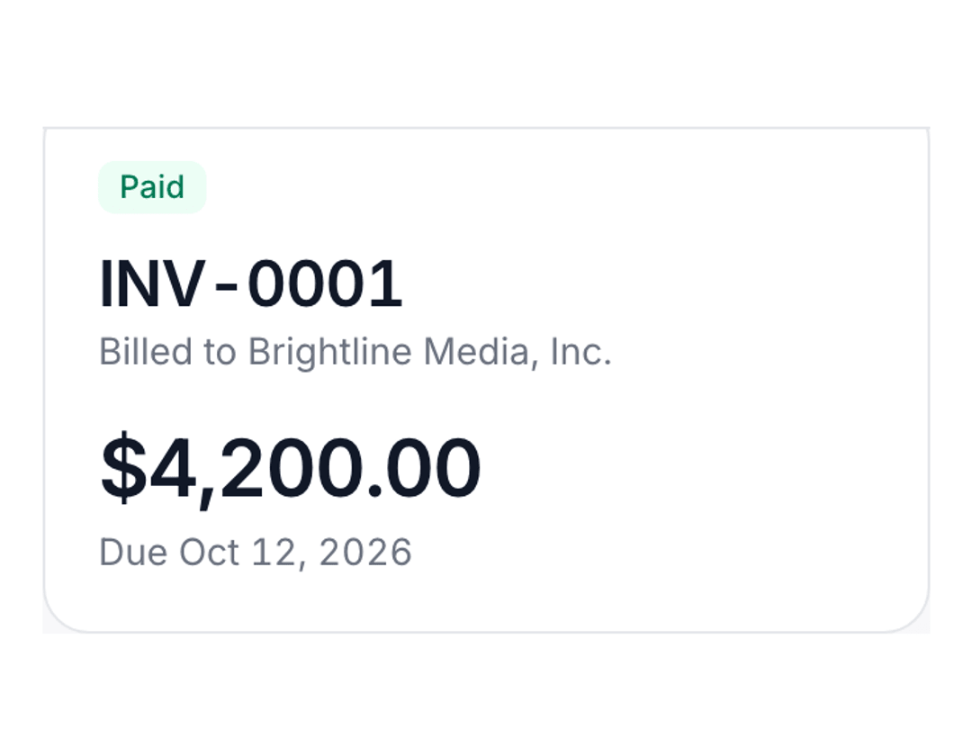 The invoice marked as paid, with the payment in its activity